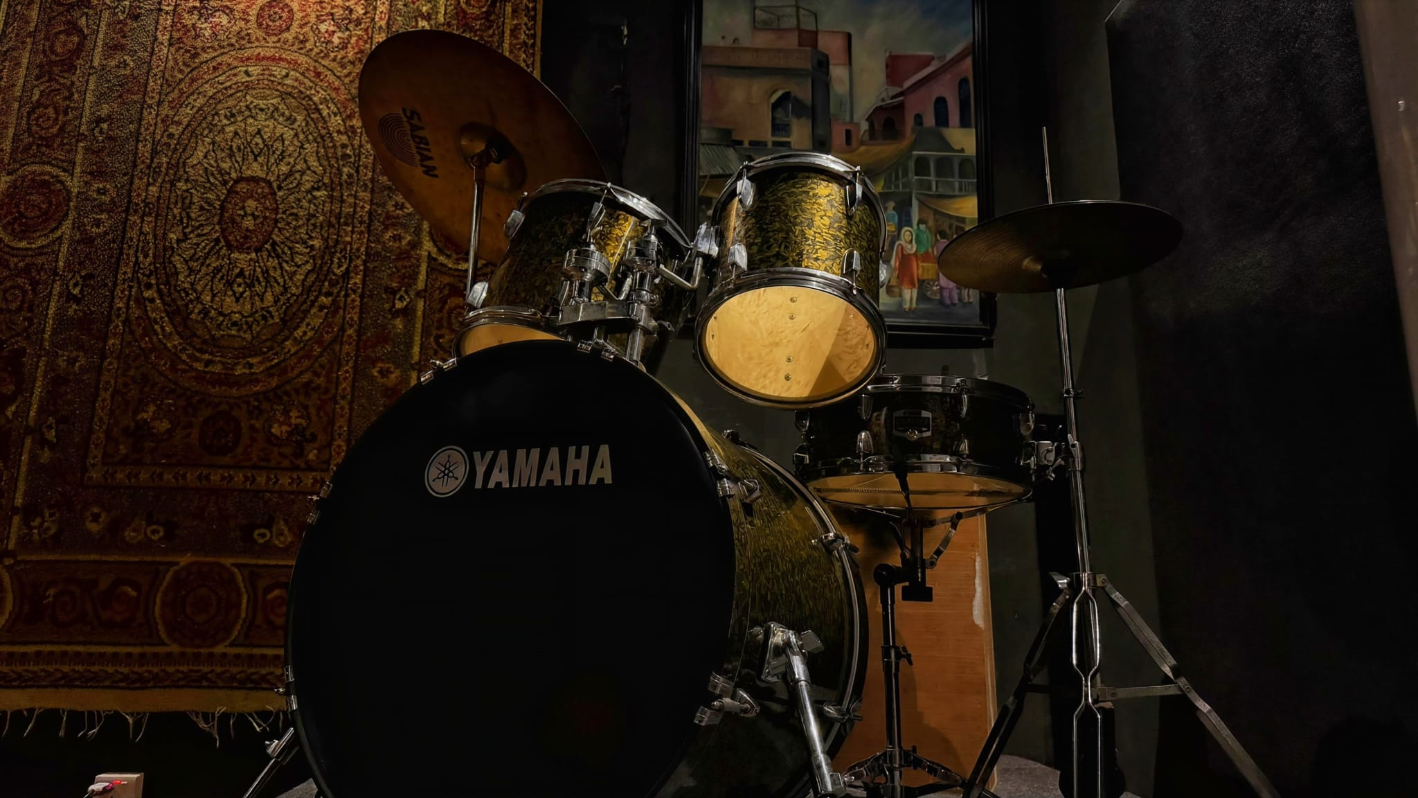Yamaha drum kit with Sabian cymbals set up on the riser
