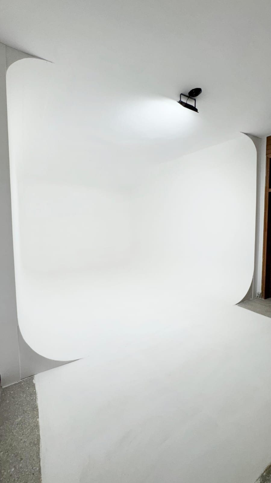 The infinity cove lit by a single overhead spot